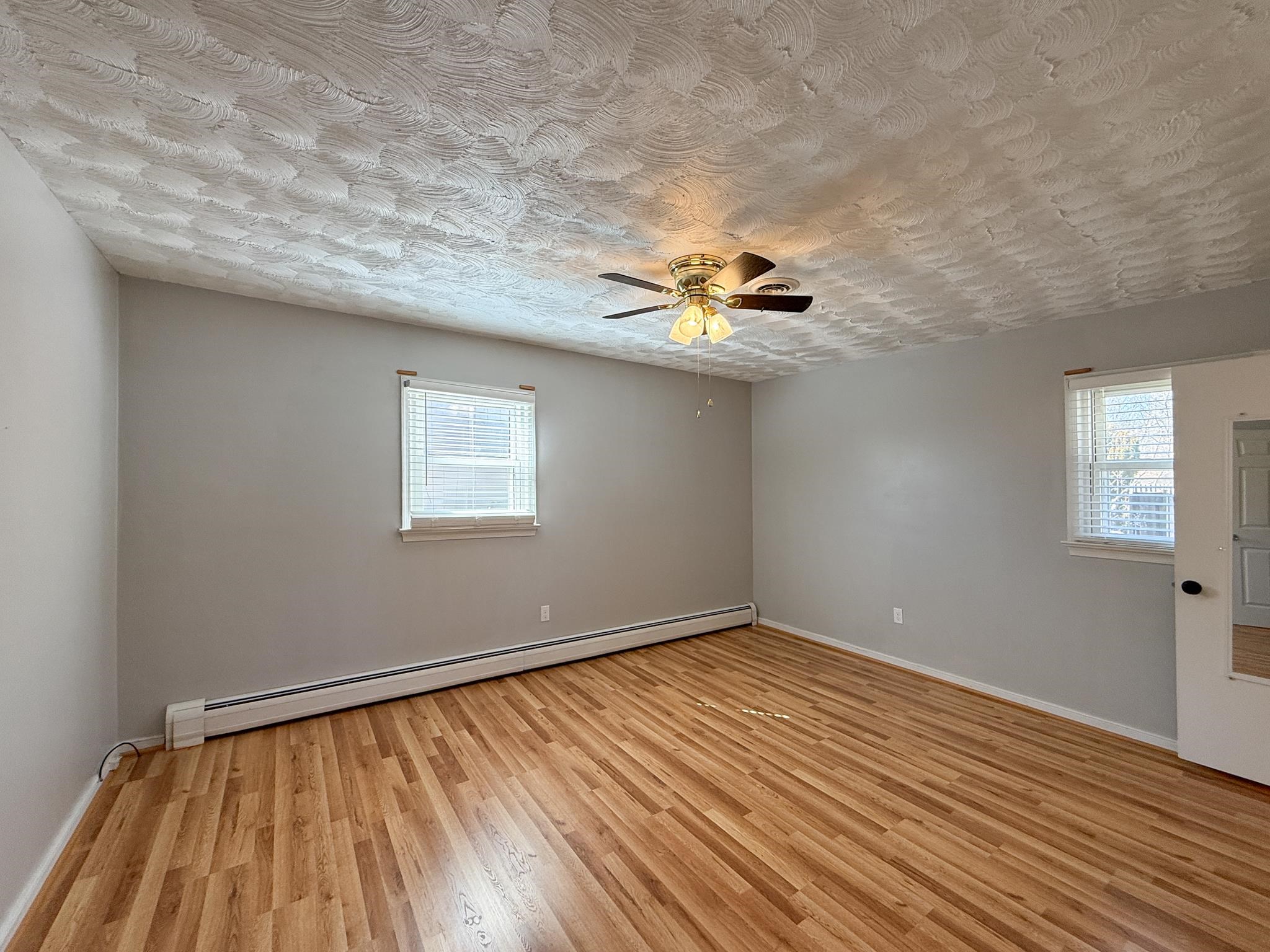 1606 Ridgeway Drive Staunton, VA 24401 - Photo 19 of 27 a view of a room with wooden floor and white walls