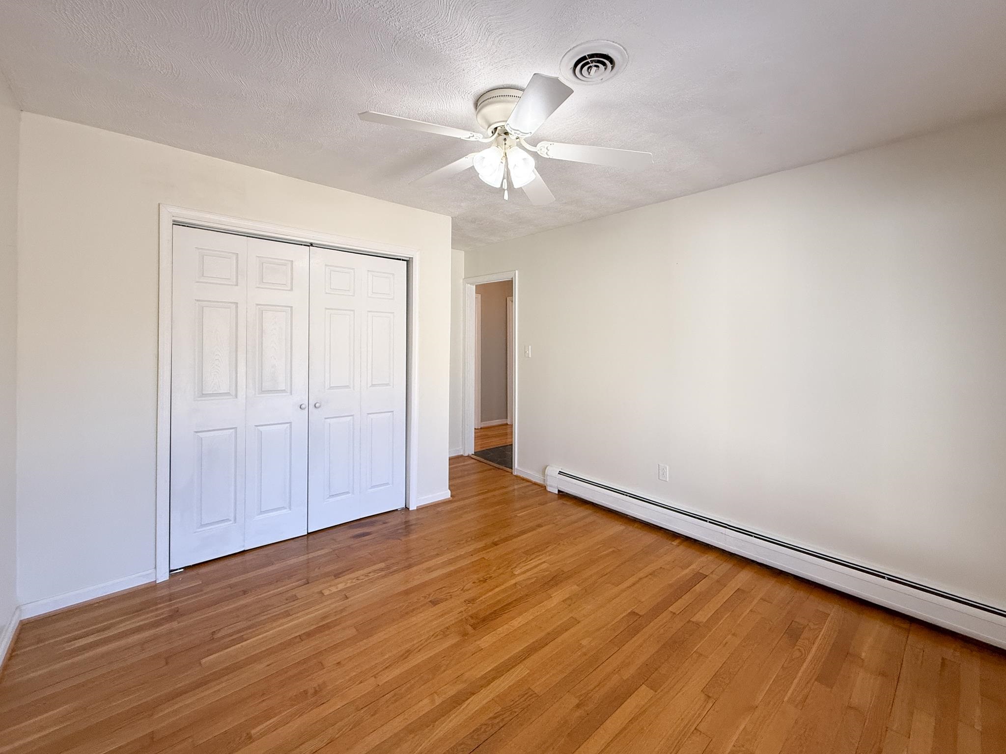 1606 Ridgeway Drive Staunton, VA 24401 - Photo 22 of 27 wooden floor in an empty room