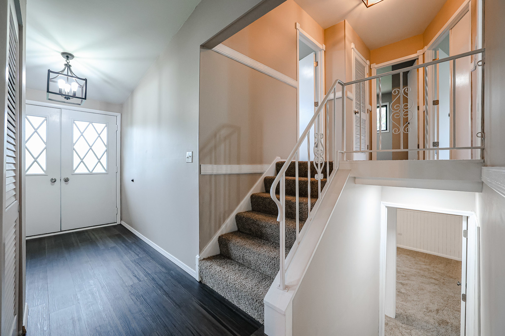 200 Hickory Drive Lindenhurst, IL 60046 - Photo 13 of 34 a view of entryway and hall with wooden floor