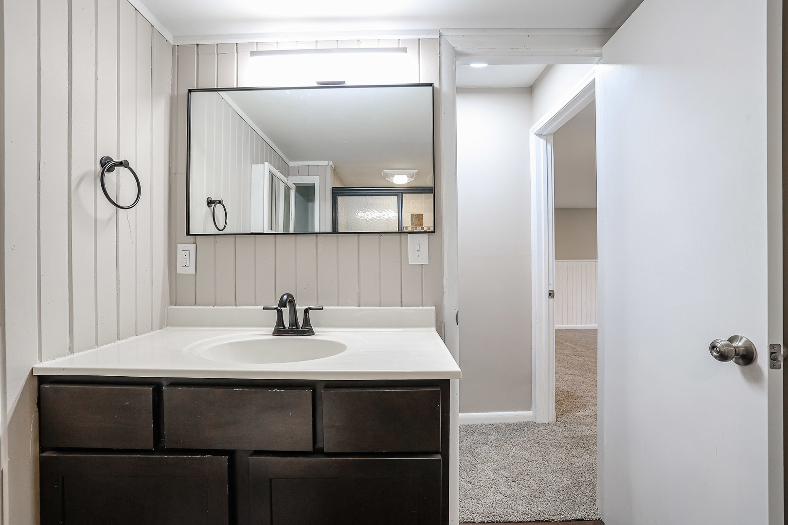 200 Hickory Drive Lindenhurst, IL 60046 - Photo 22 of 34 a bathroom with a sink and a mirror