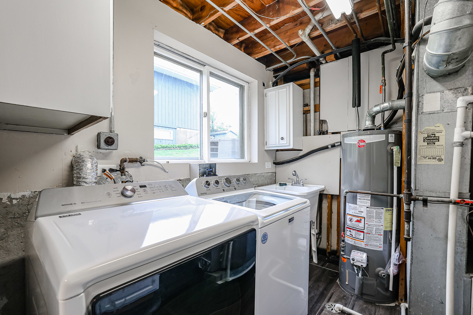 200 Hickory Drive Lindenhurst, IL 60046 - Photo 28 of 34 a utility room with dryer and washer