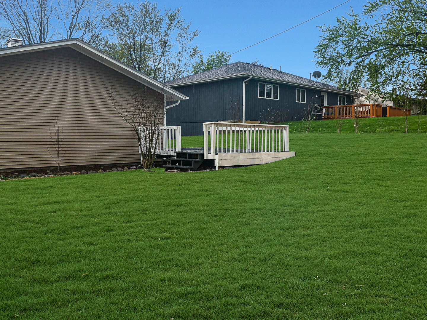 200 Hickory Drive Lindenhurst, IL 60046 - Photo 29 of 34 a front view of a house with a yard