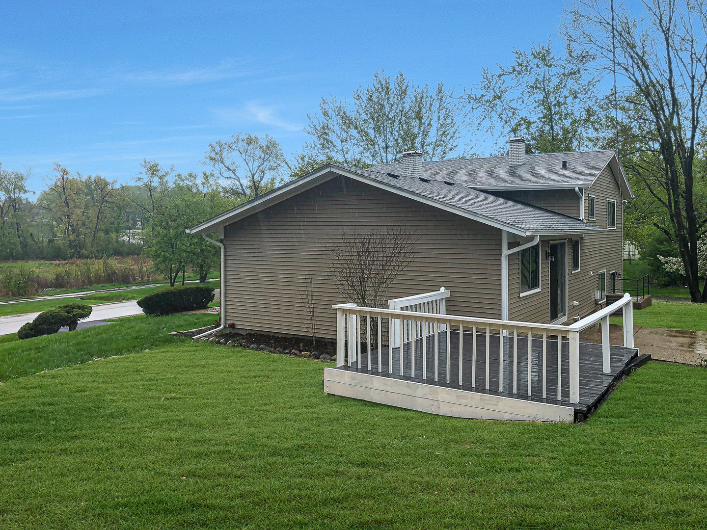 200 Hickory Drive Lindenhurst, IL 60046 - Photo 30 of 34 a view of a deck that has a yard