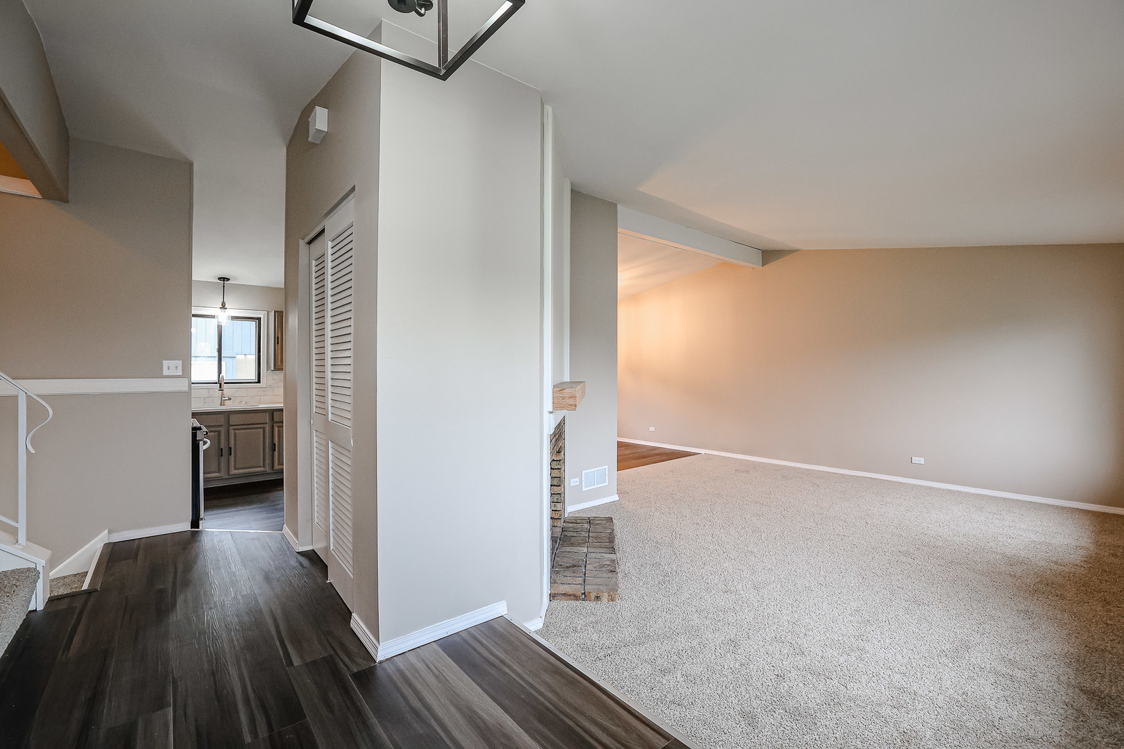 200 Hickory Drive Lindenhurst, IL 60046 - Photo 3 of 34 wooden floor in an empty room with a window
