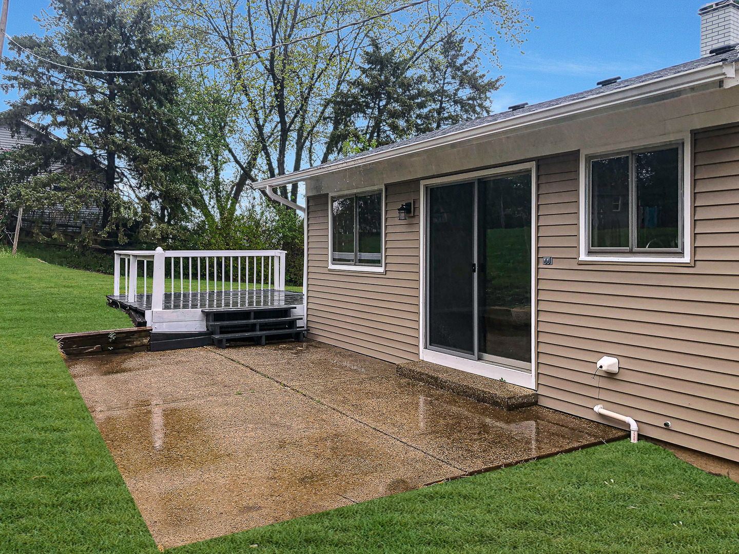 200 Hickory Drive Lindenhurst, IL 60046 - Photo 33 of 34 a view of backyard with deck and garden