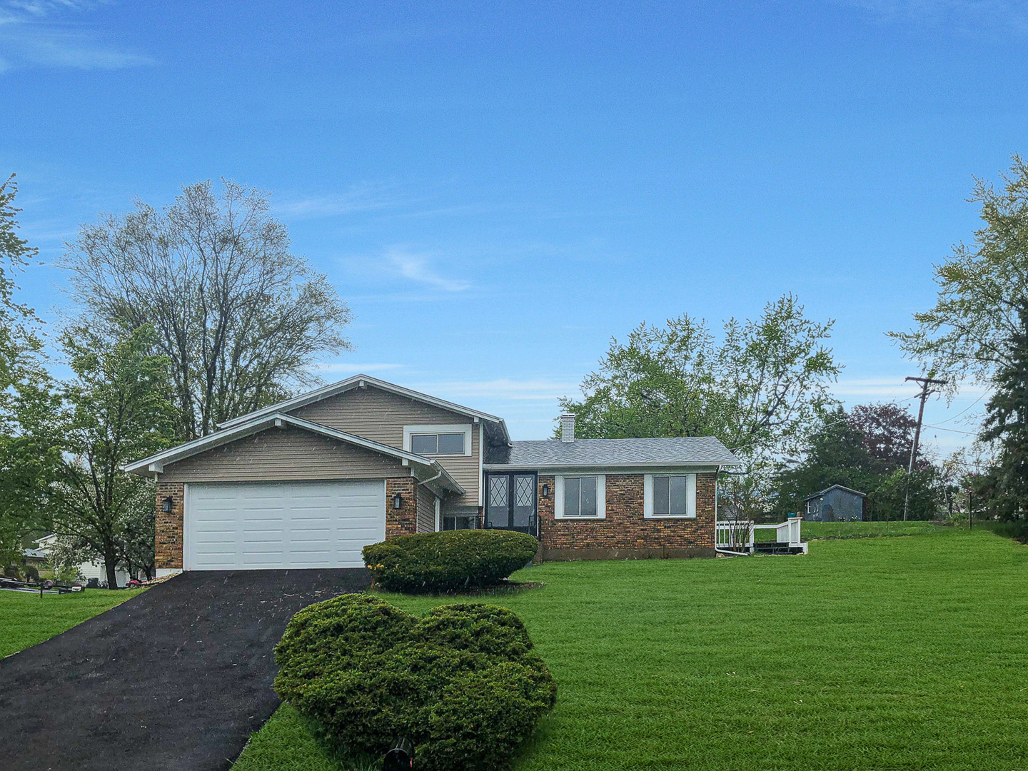 200 Hickory Drive Lindenhurst, IL 60046 - Photo 34 of 34 a front view of a house with a yard