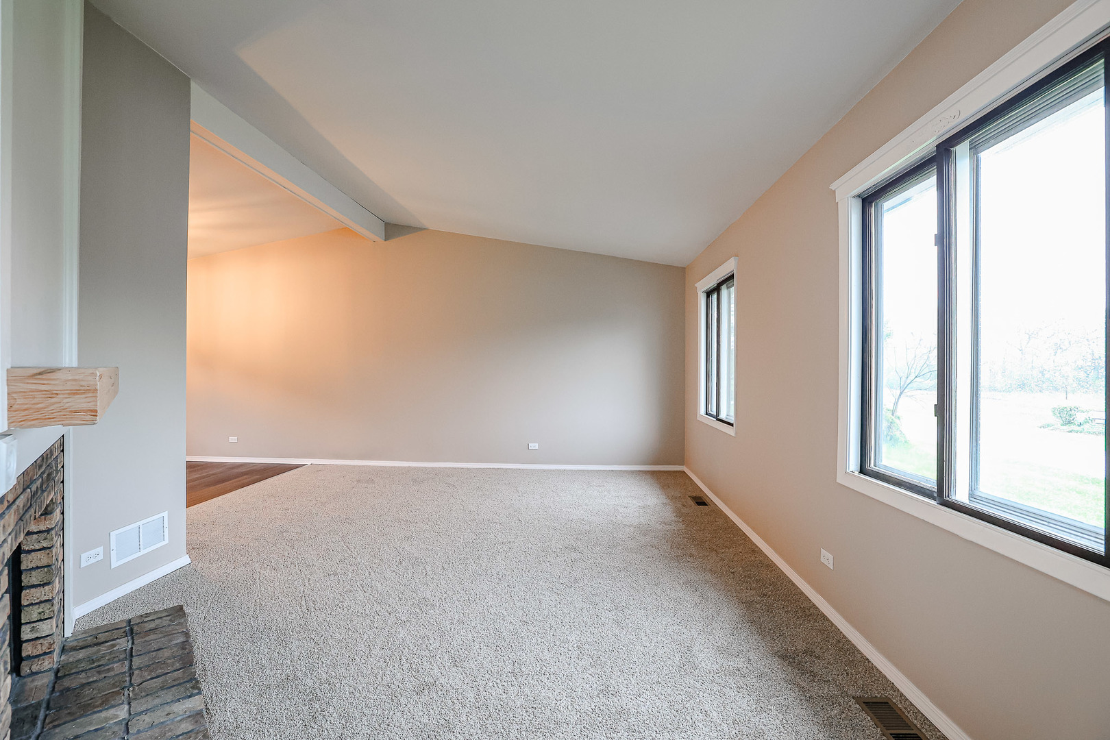 200 Hickory Drive Lindenhurst, IL 60046 - Photo 4 of 34 an empty room with windows and closet
