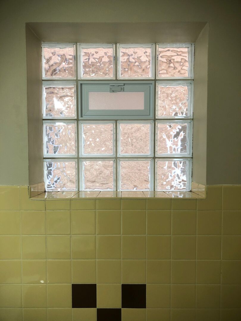 6742 West 63rd Street, Unit 1 Chicago, IL 60638 - Photo 21 of 21 a bathroom with a window