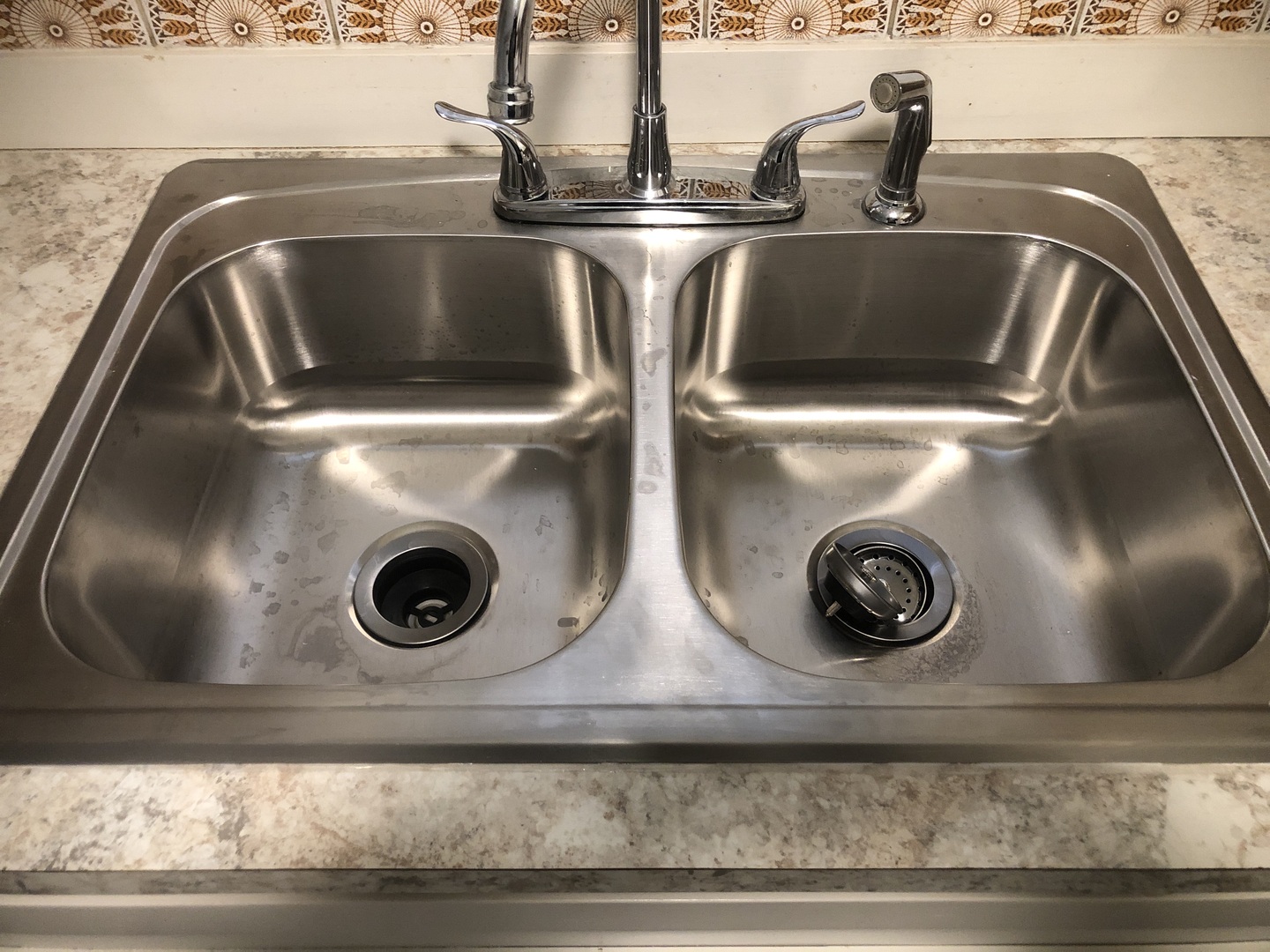 6742 West 63rd Street, Unit 1 Chicago, IL 60638 - Photo 5 of 21 a close view of sink stove