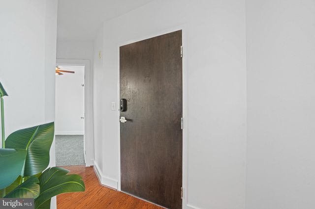 a bathroom with a toilet and shower