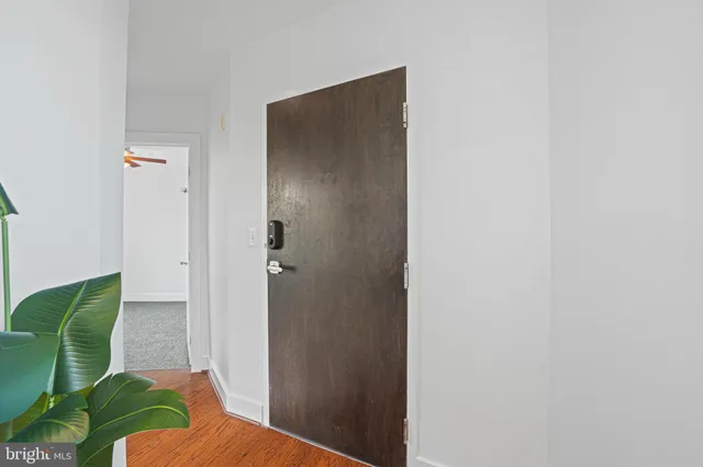 a bathroom with a toilet and shower
