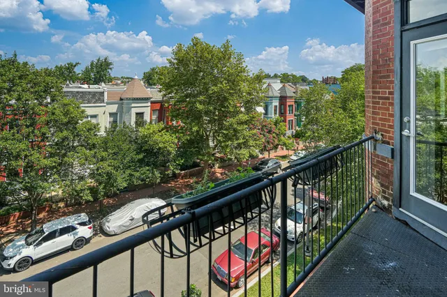 a view of a city from a balcony