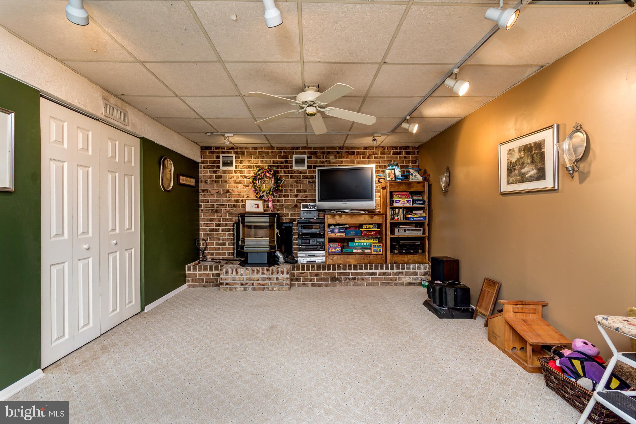 9004 Moonstone Road Baltimore, MD 21236 - Photo 24 of 30 Basement Family Room w/Fireplace