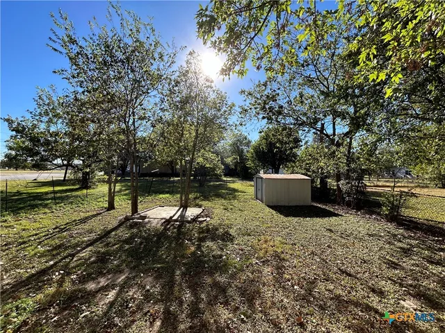 a lake view with a bench