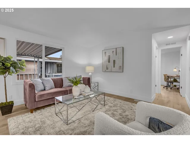 a kitchen with a sink appliances and cabinets