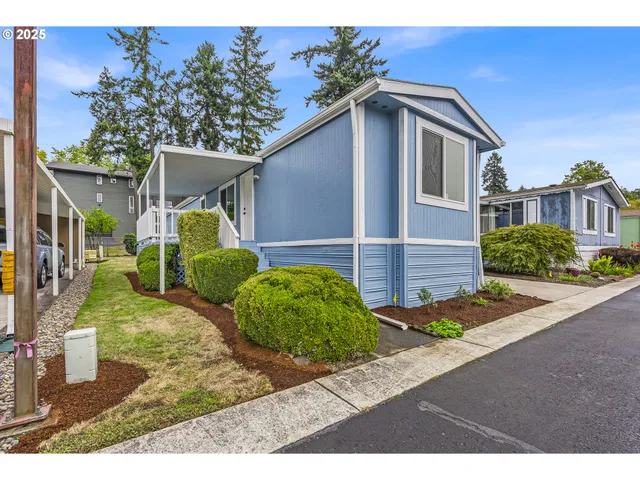 a view of an outdoor space and front view of a house