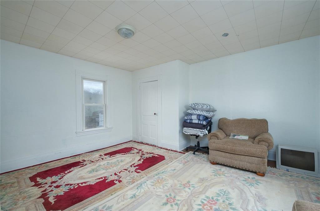 2793 Italy Road Export, PA 15632 - Photo 20 of 23 a bedroom with a bed and a couch