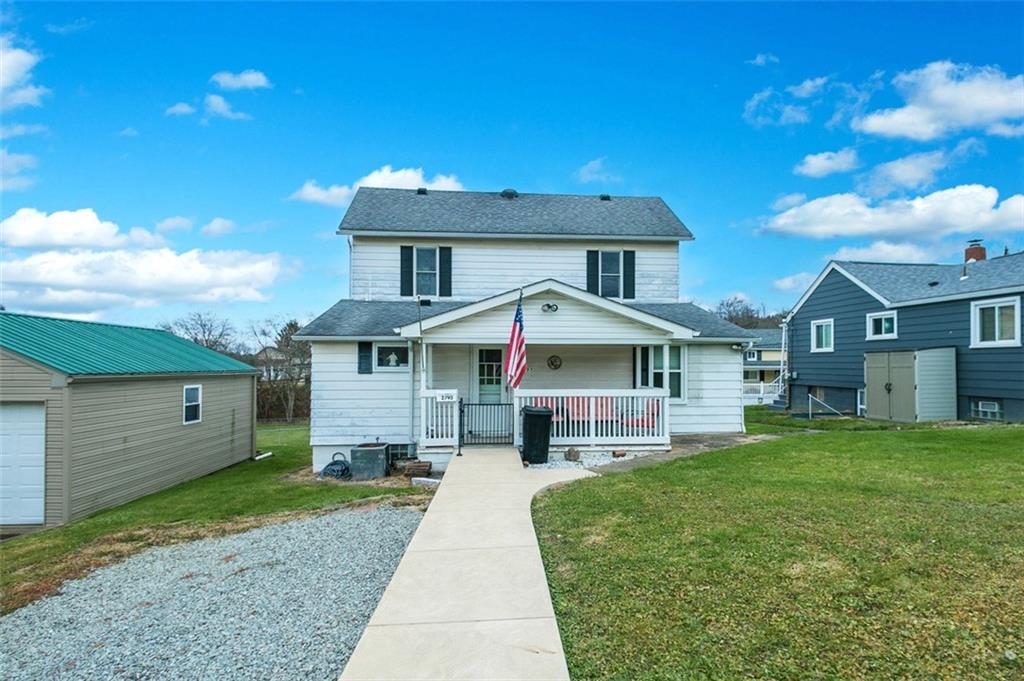 2793 Italy Road Export, PA 15632 - Photo 8 of 23 a front view of a house with a yard