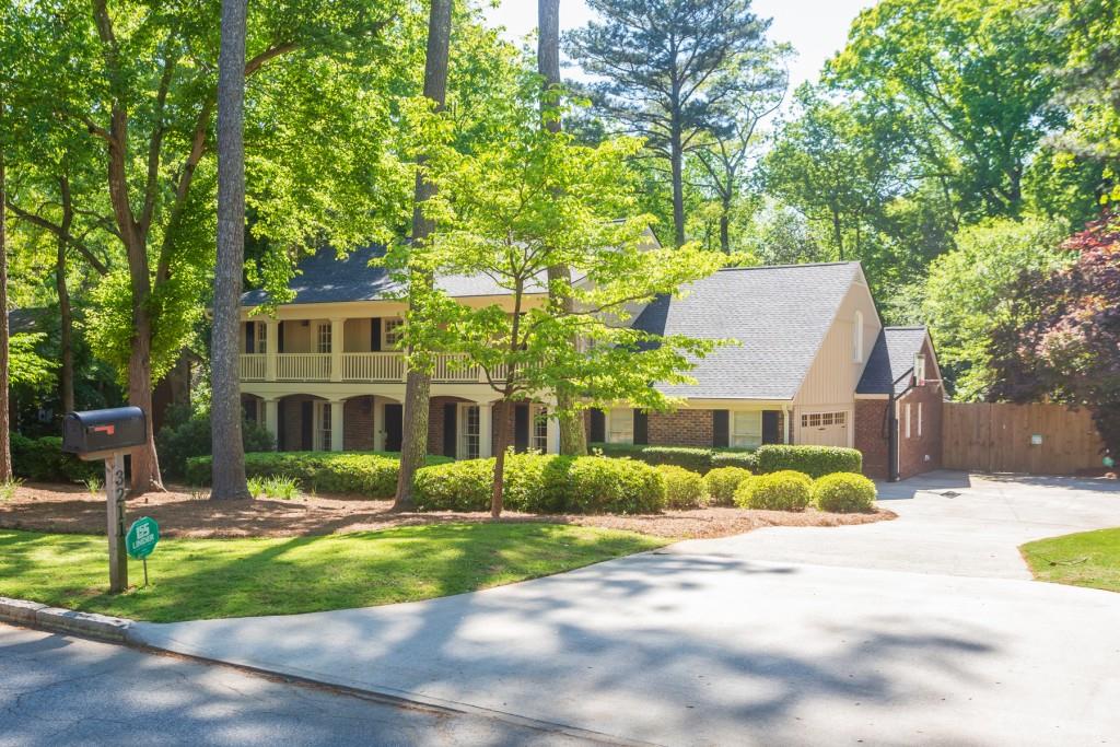 3211 Rockingham Drive Northwest Atlanta, GA 30327 - Photo 1 of 1 a view of a house with a backyard