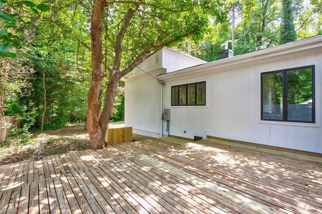 140 Penny Road Jamestown, NC 27282 - Photo 19 of 34 Deck space off Dining room! SO many different outdoor areas to entertain!