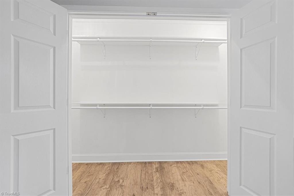 140 Penny Road Jamestown, NC 27282 - Photo 30 of 34 Large closet space in Primary bedroom