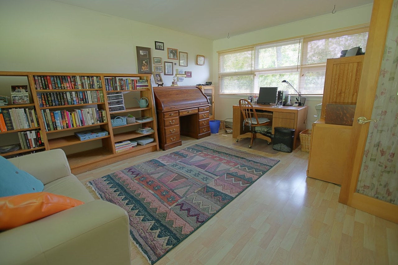 375 Main Road Monterey, MA 01245 - Photo 8 of 19 a living room with furniture and a book shelf