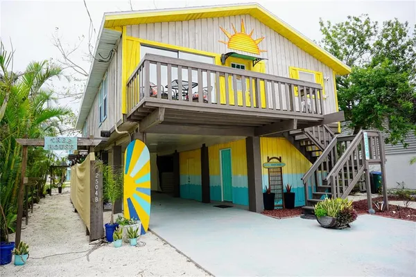 a view of a large building with a swimming pool