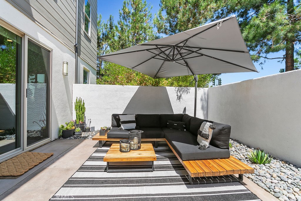 152 Modjeska Irvine, CA 92618 - Photo 11 of 30 a view of backyard of house with seating space