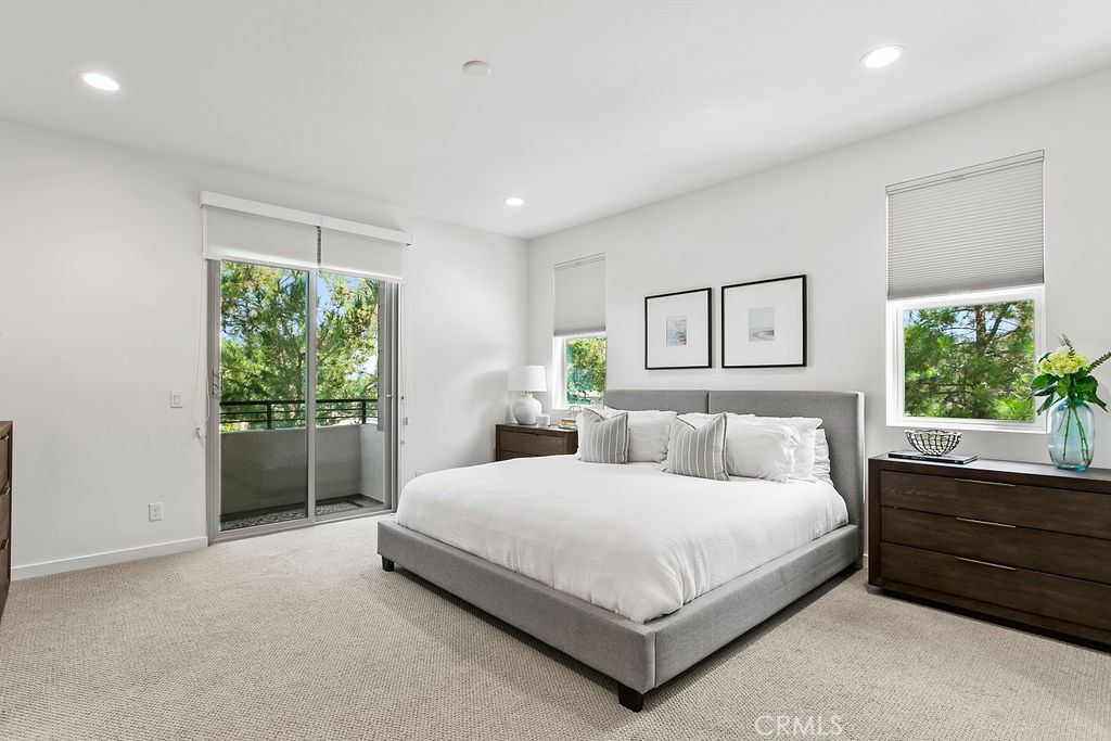 152 Modjeska Irvine, CA 92618 - Photo 13 of 30 a bedroom with a large bed and a window