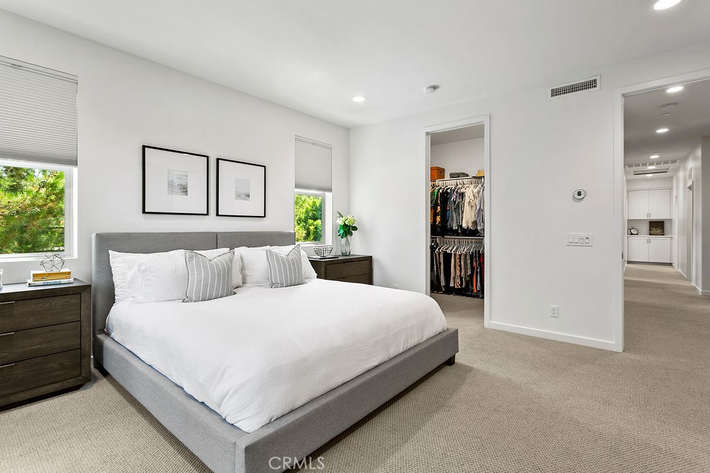 152 Modjeska Irvine, CA 92618 - Photo 14 of 30 a bedroom with a bed and a large window