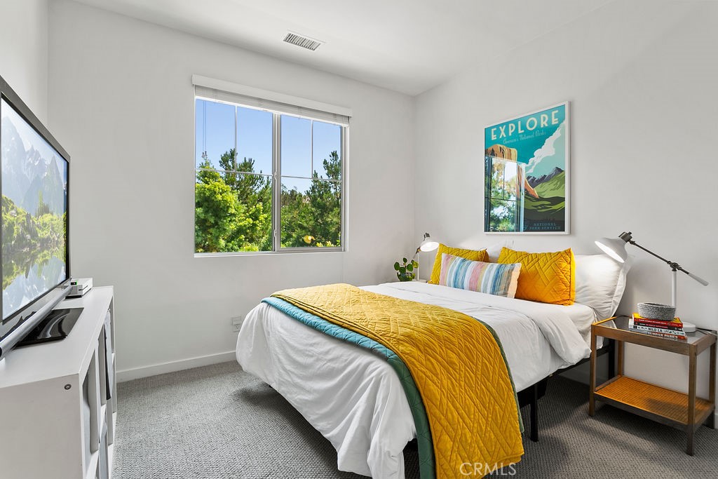 152 Modjeska Irvine, CA 92618 - Photo 17 of 30 a bedroom with a bed and a window