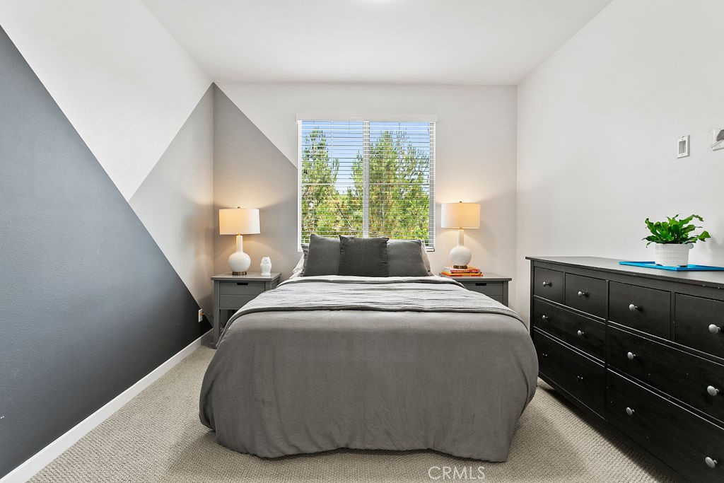 152 Modjeska Irvine, CA 92618 - Photo 18 of 30 a bedroom with a bed and window