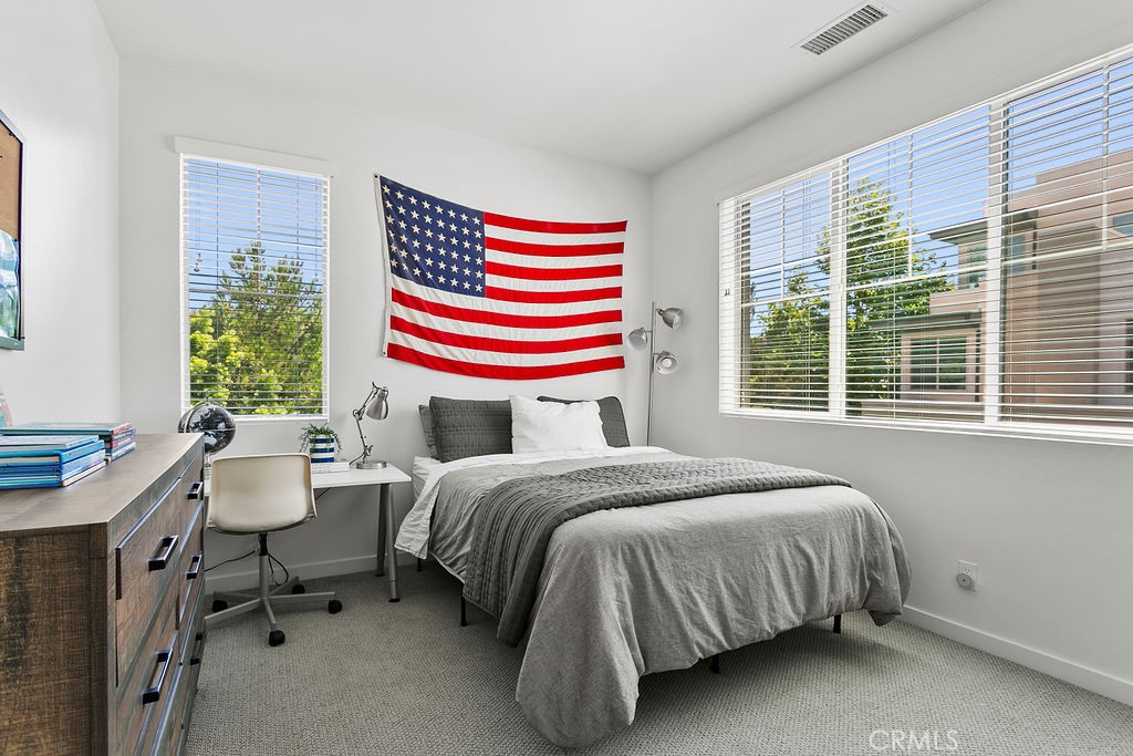 152 Modjeska Irvine, CA 92618 - Photo 19 of 30 a bedroom with a bed and a window