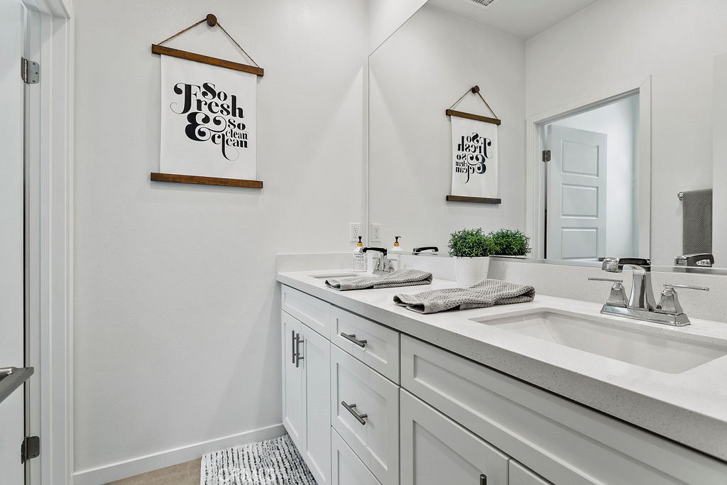 152 Modjeska Irvine, CA 92618 - Photo 20 of 30 a bathroom with a sink and a mirror