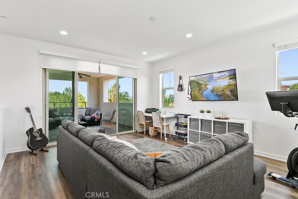 152 Modjeska Irvine, CA 92618 - Photo 24 of 30 a living room with furniture and a large window