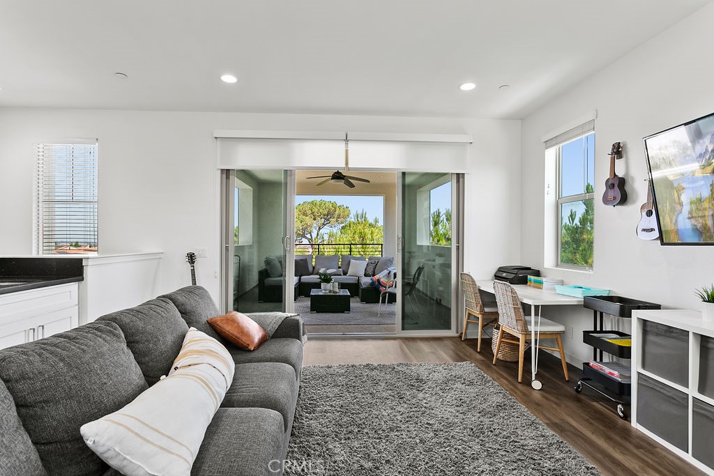 152 Modjeska Irvine, CA 92618 - Photo 26 of 30 a living room with furniture and a large window