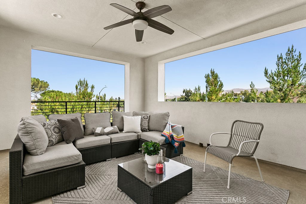 152 Modjeska Irvine, CA 92618 - Photo 27 of 30 a living room with furniture and a large window