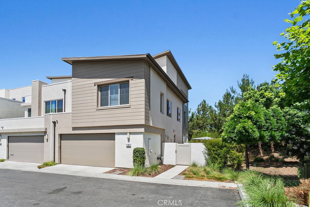 152 Modjeska Irvine, CA 92618 - Photo 3 of 30 a front view of a house with a yard