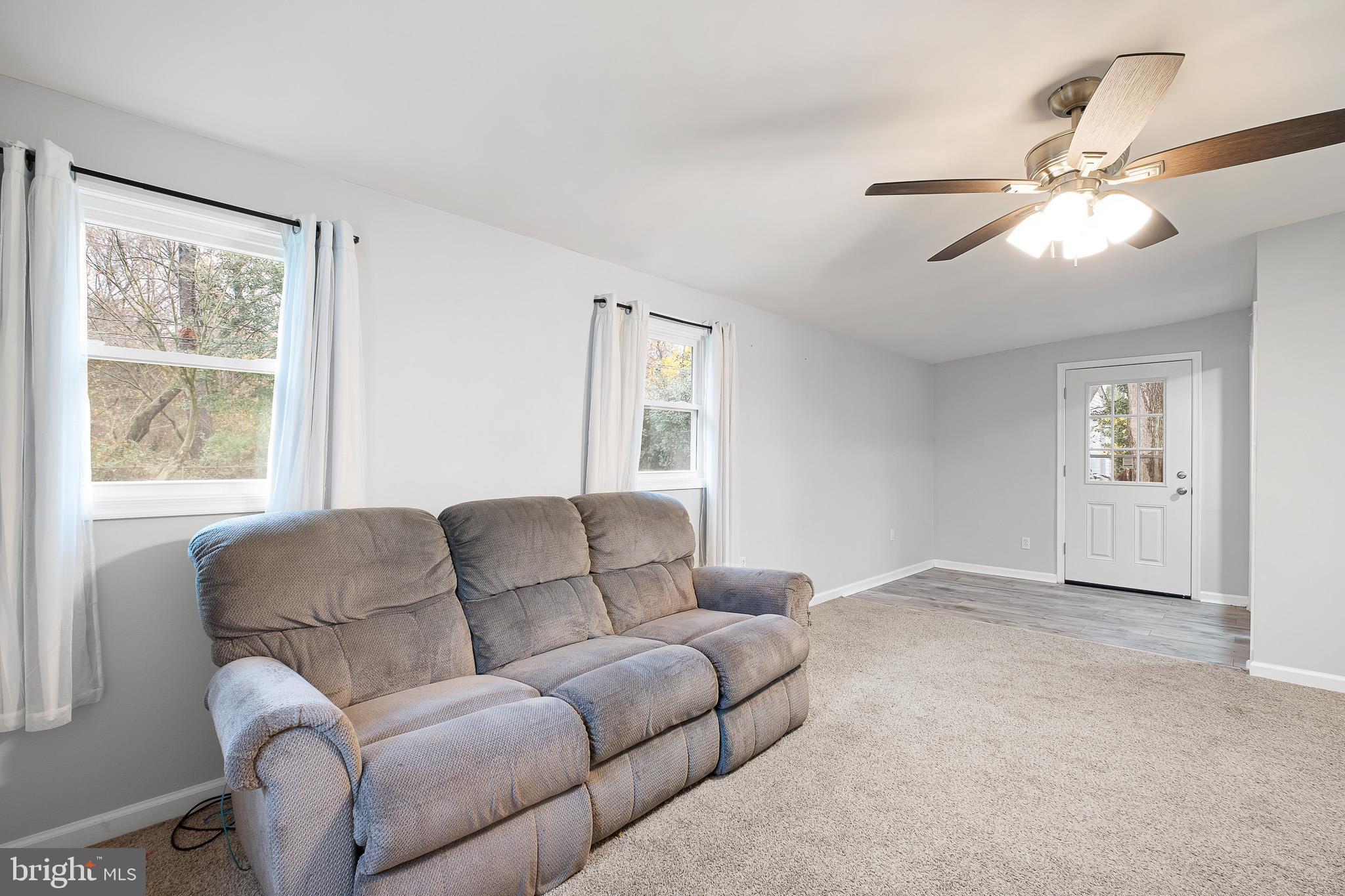 107 Anderson Road Newark, DE 19713 - Photo 11 of 28 a living room with furniture and a window