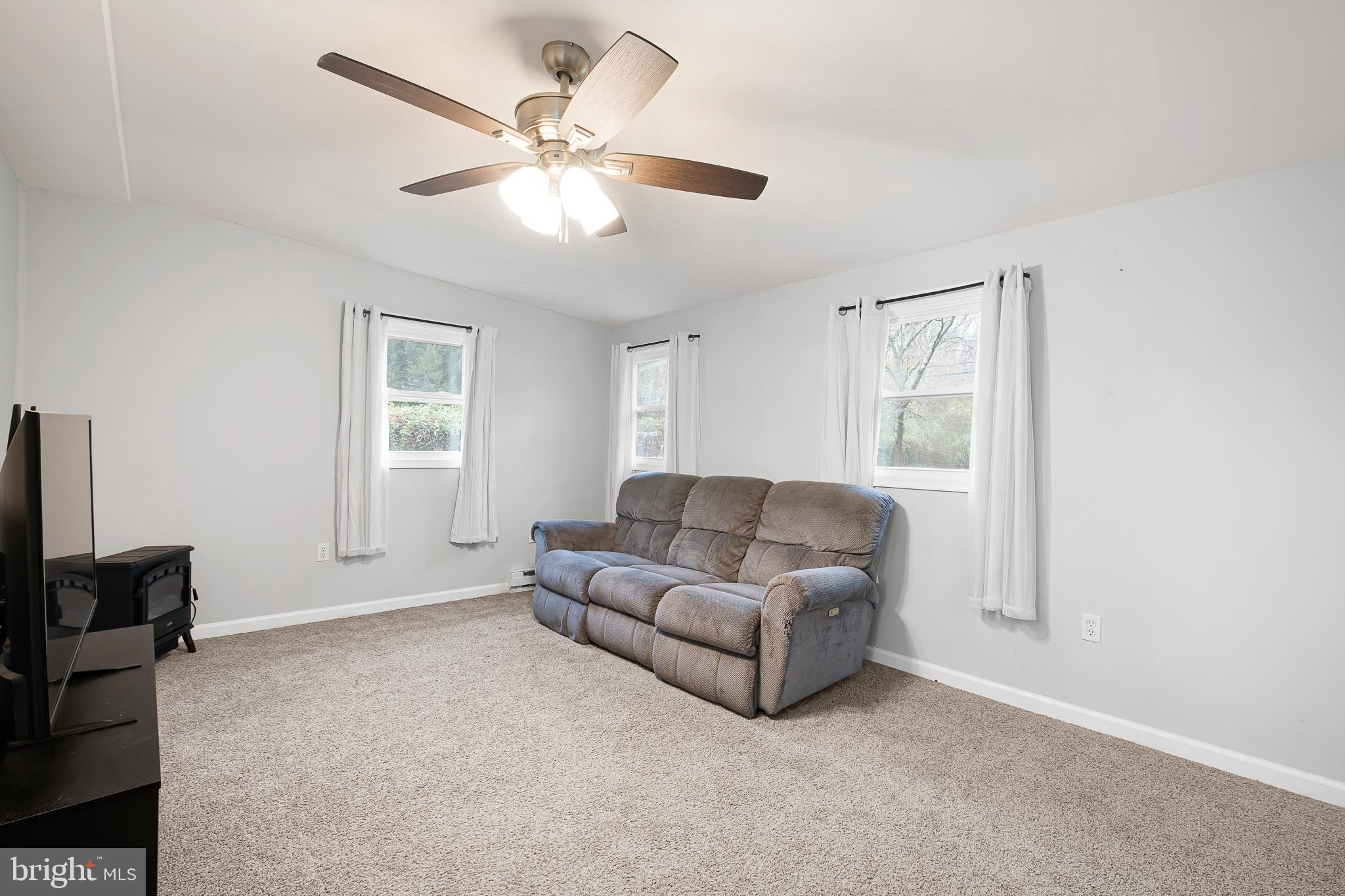 107 Anderson Road Newark, DE 19713 - Photo 16 of 28 a living room with furniture and a window