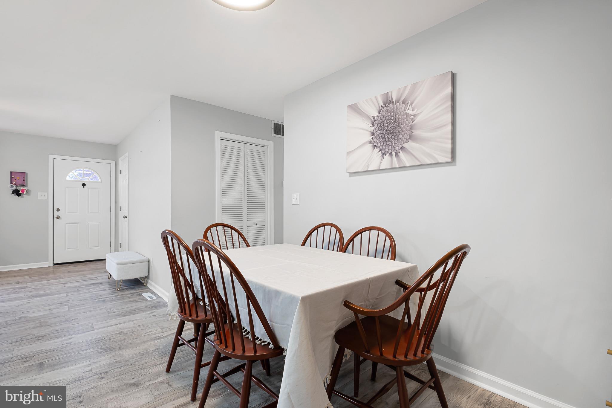 107 Anderson Road Newark, DE 19713 - Photo 10 of 28 a view of a dining room that has a table and chairs