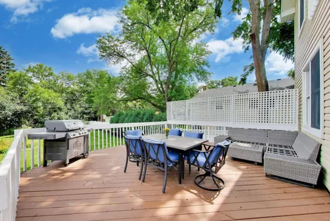 a view of a deck patio and outdoor seating