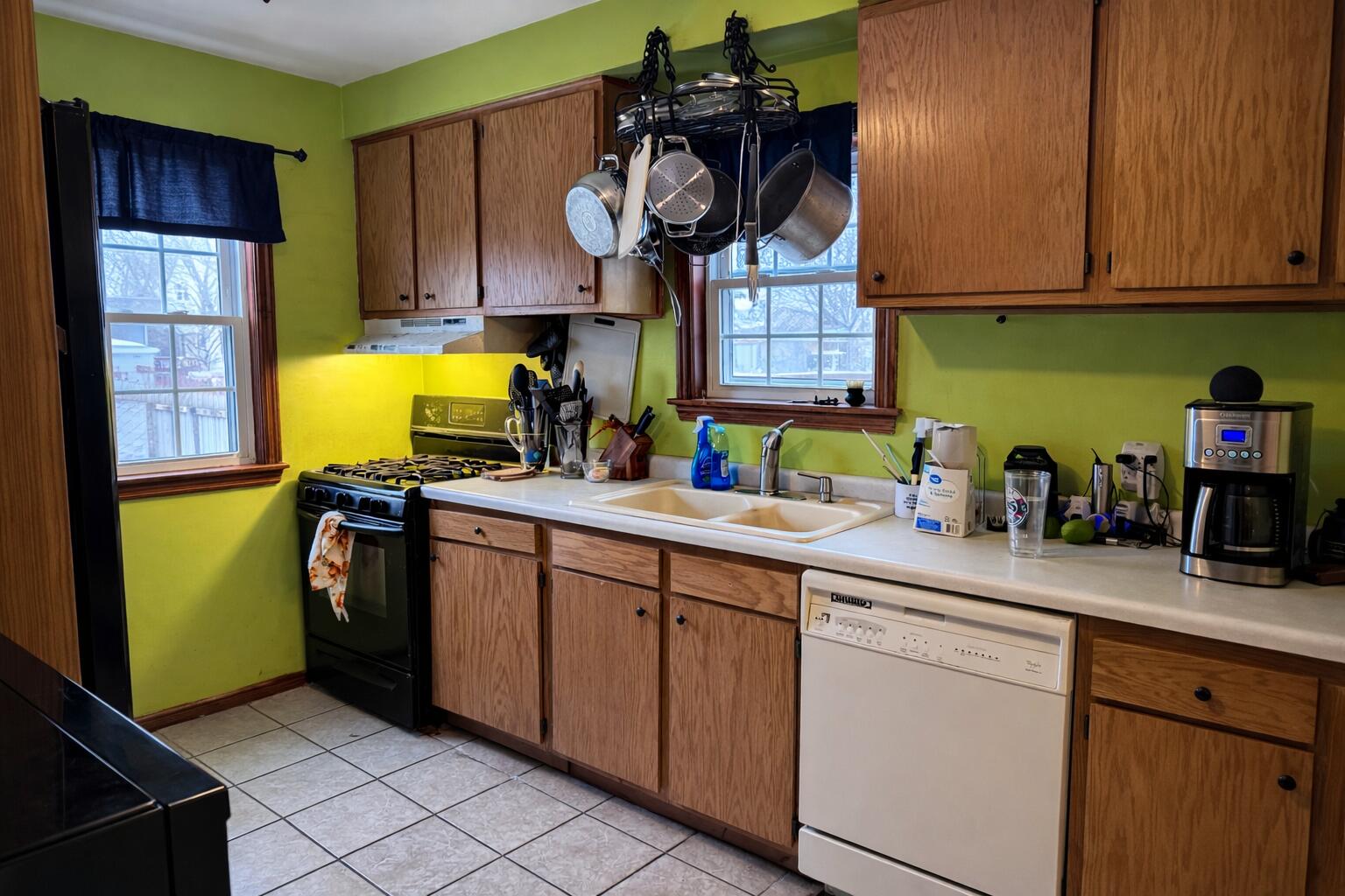 7341 Harrison Avenue Hammond, IN 46324 - Photo 8 of 16 a kitchen with stainless steel appliances granite countertop a sink and a cabinets