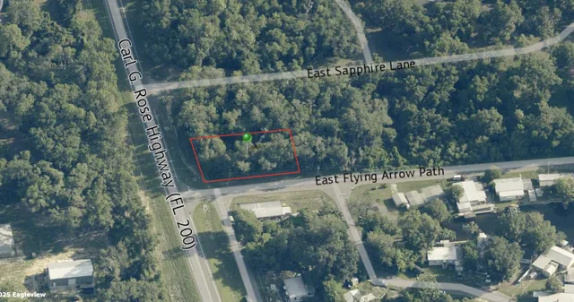 a view of a forest from a balcony