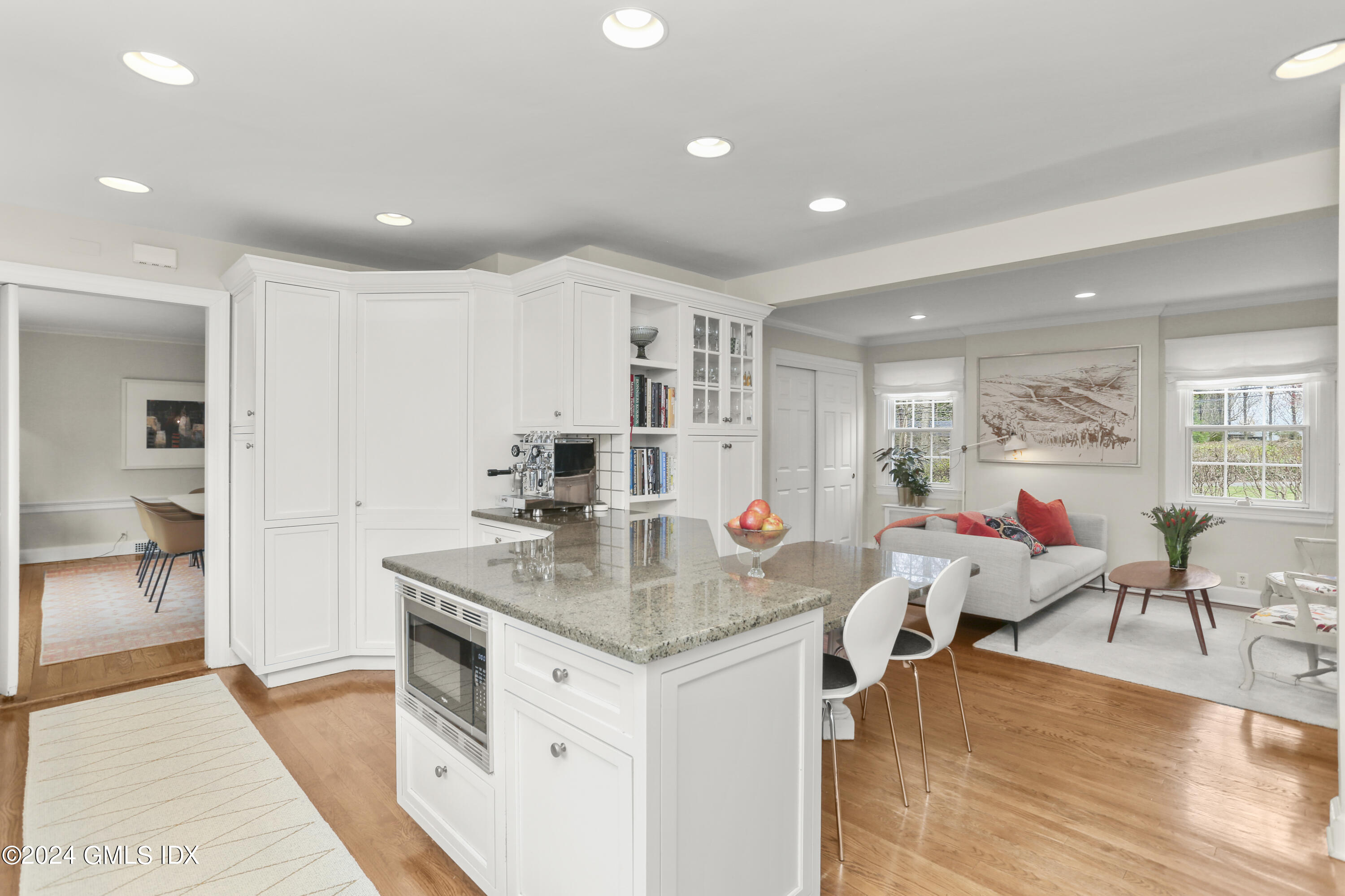 7 Willowmere Avenue Riverside, CT 06878 - Photo 13 of 31 a very nice looking living room with kitchen island furniture and a wooden floor