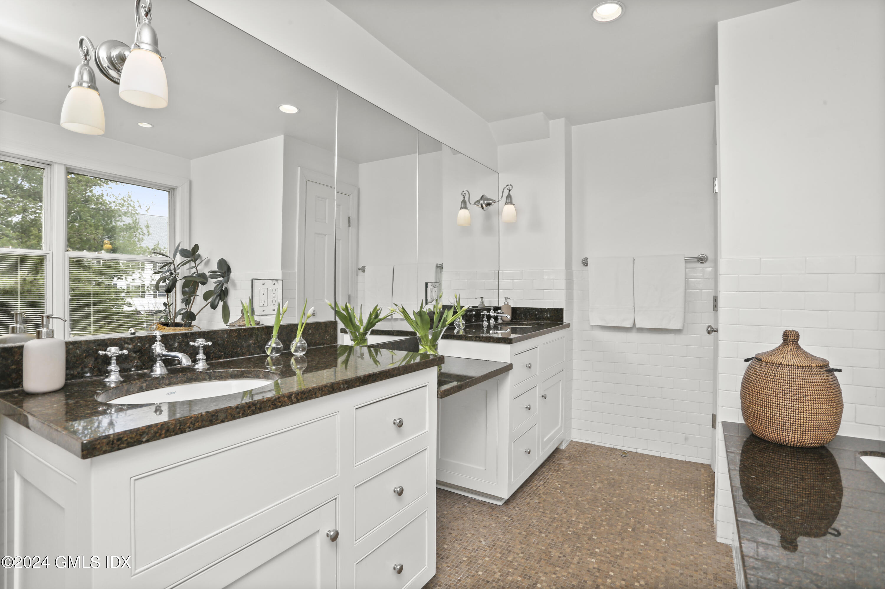 7 Willowmere Avenue Riverside, CT 06878 - Photo 18 of 31 a bathroom with a granite countertop sink and a mirror