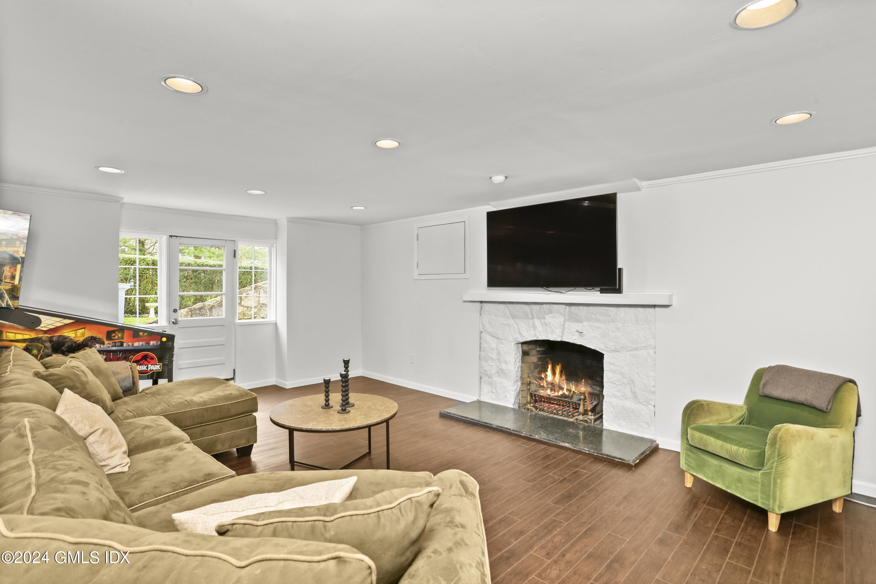 7 Willowmere Avenue Riverside, CT 06878 - Photo 24 of 31 a living room with furniture fireplace and window
