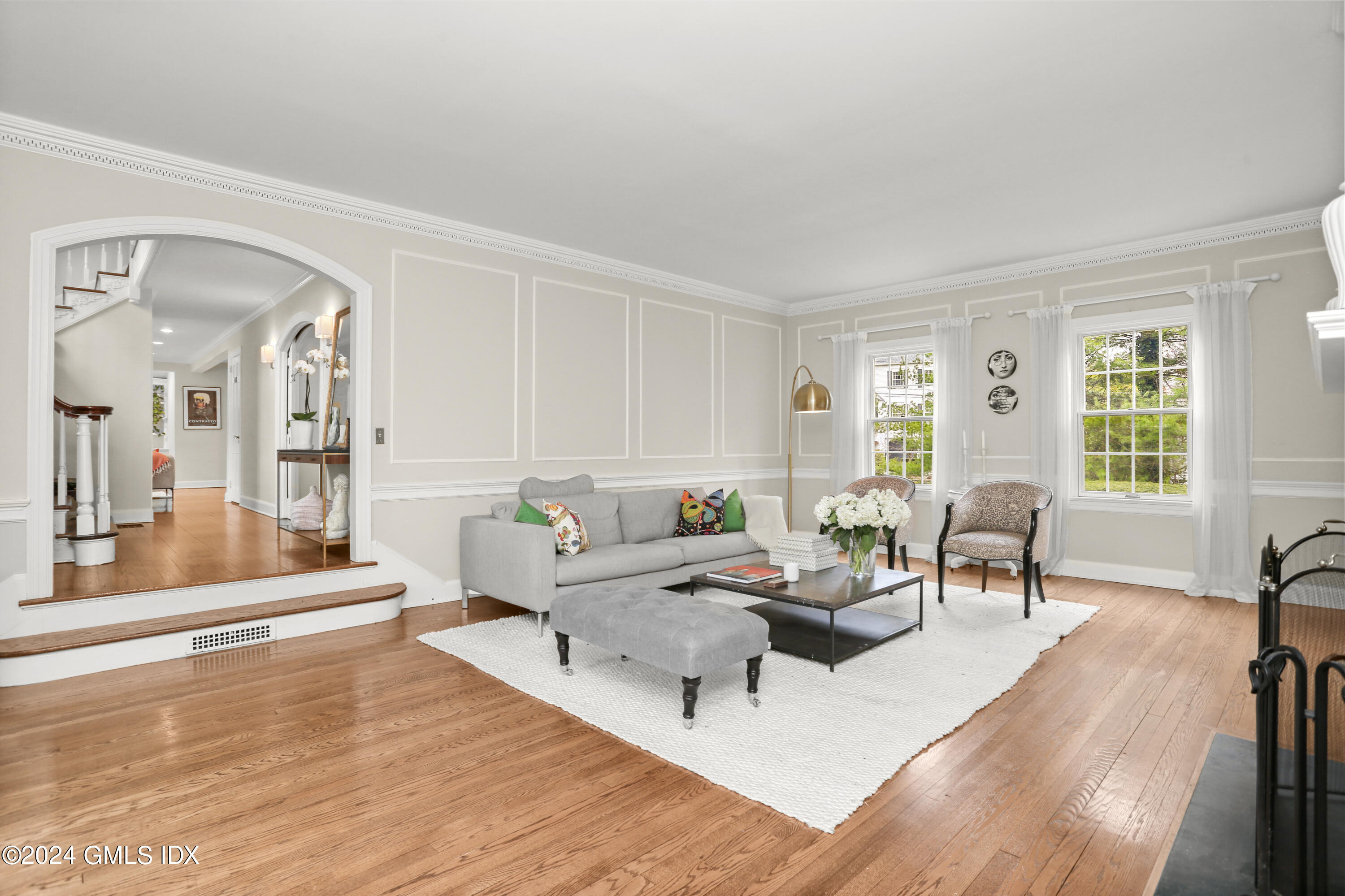 7 Willowmere Avenue Riverside, CT 06878 - Photo 5 of 31 a living room with furniture and a large window