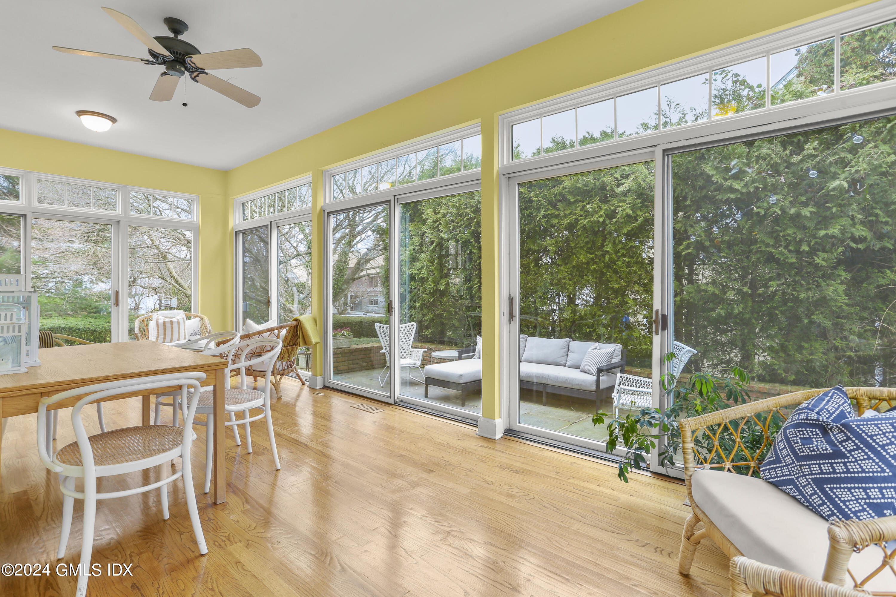 7 Willowmere Avenue Riverside, CT 06878 - Photo 6 of 31 a dining room with furniture water view and a large window