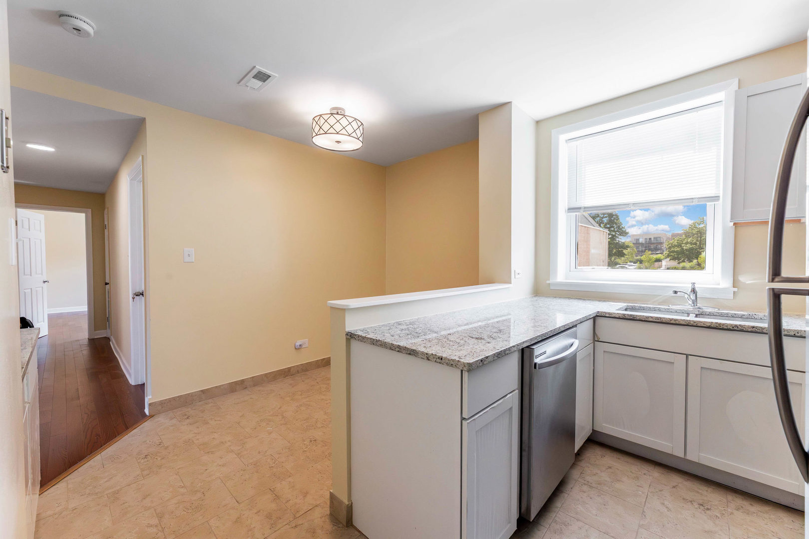 6104 South Dorchester Avenue, Unit 1S Chicago, IL 60637 - Photo 9 of 16 a kitchen with a sink and a window